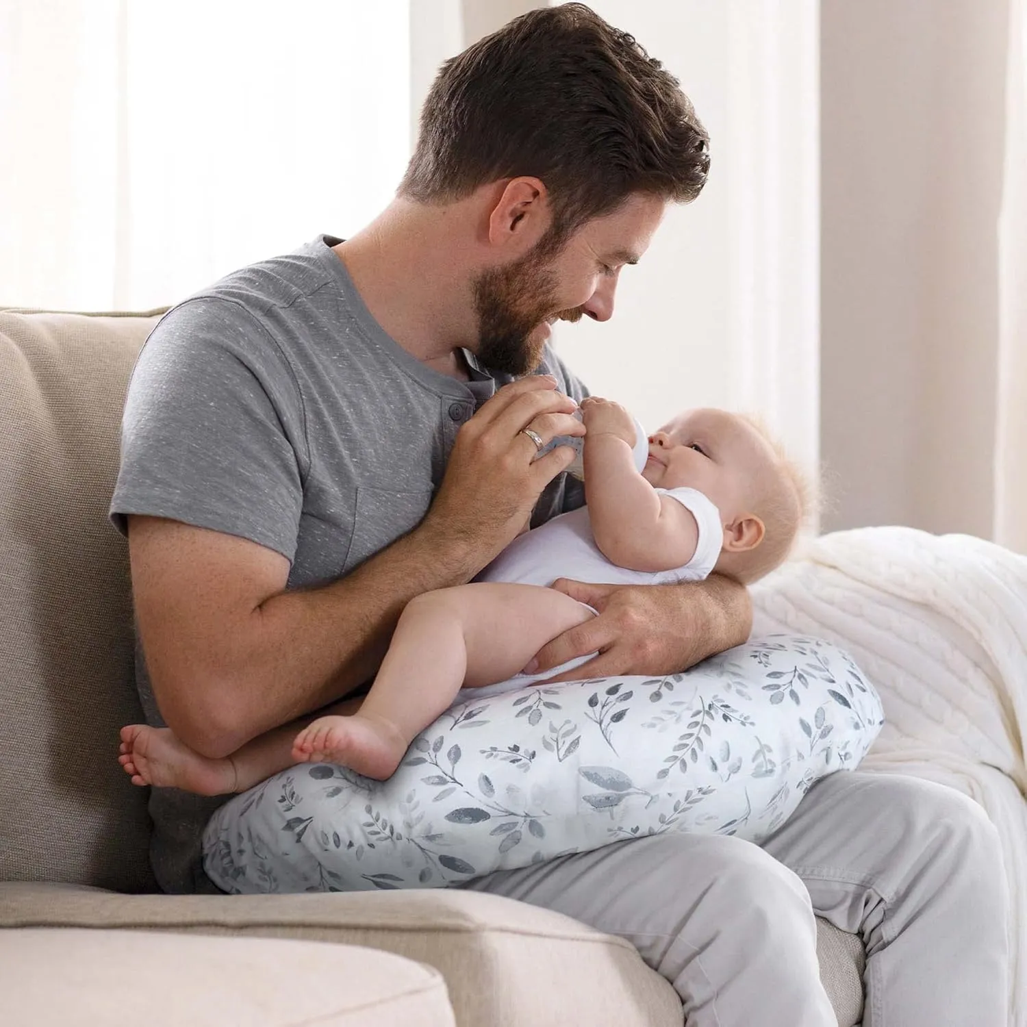Boppy Original Nursing Pillow, Gray Taupe Leaves, Ergonomic Nursing Essentials for Bottle and Breastfeeding, Firm Fiber Fill, with Removable Pillow Cover, Machine Washable